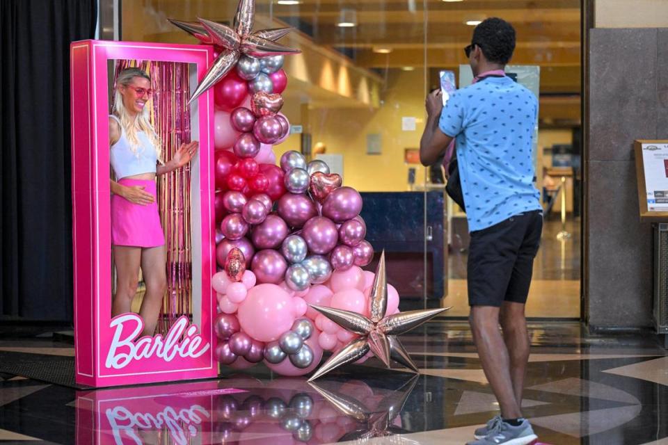 Laura Miller had her photo taken in a life-size Barbie box by her husband, Neville Miller during a visit to Union Station. The couple are from Parkville. Tammy Ljungblad/tljungblad@kcstar.com