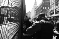 <p>Police detain a protester outside the convention center. (Photo: Khue Bui/Yahoo News)</p>