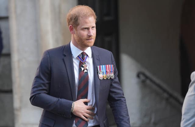 The Duke of Sussex, in a suit and wearing his medals, leaves St Paul’s Cathedral in May after attending a service of thanksgiving to mark the 10th anniversary of the Invictus Games 