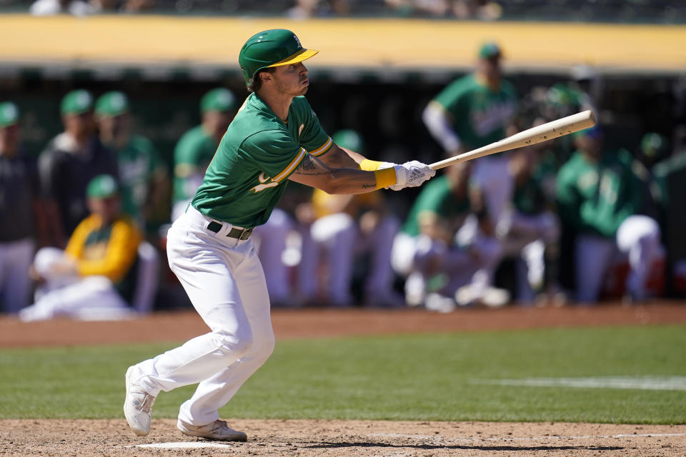Oakland Athletics' Skye Bolt watches his sacrifice fly that scored David MacKinnon during the 10th inning of a baseball game against the Miami Marlins in Oakland, Calif., Wednesday, Aug. 24, 2022. (AP Photo/Jeff Chiu)