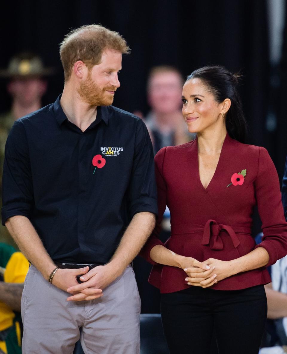 Prince Harry and Meghan Markle enjoy themselves at the wheelchair basketball final during the Invictus Games.