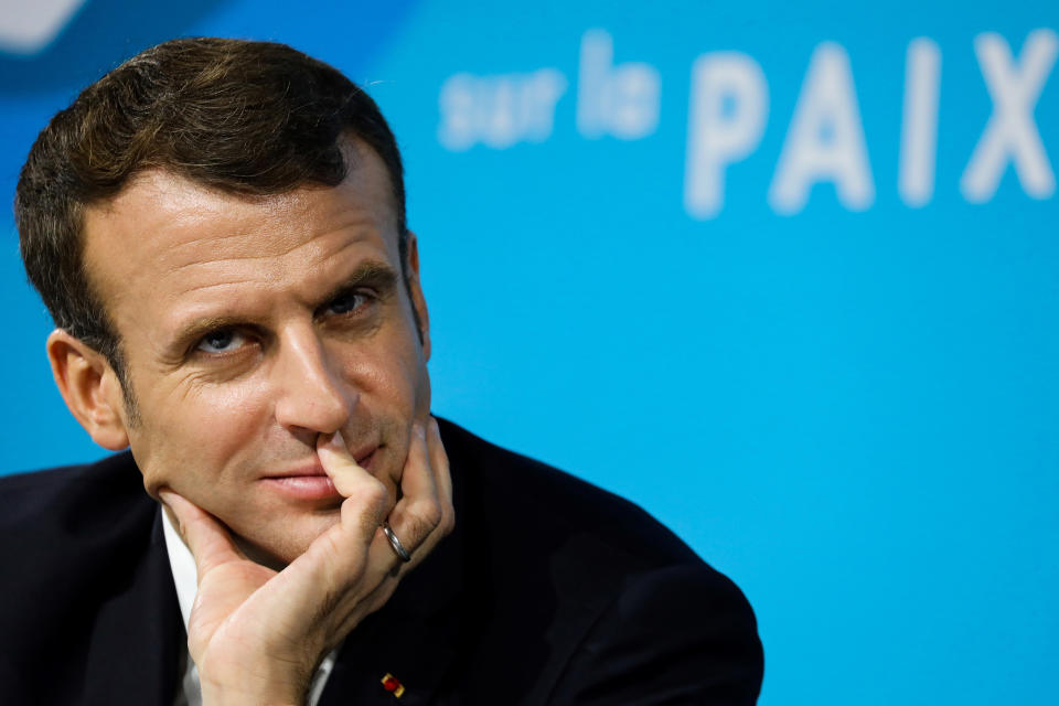 French President Emmanuel Macron attends the Paris Peace Forum, Tuesday, Nov. 12, 2019 in Paris. French President Emmanuel Macron is hosting an international peace forum _ in the notable absence of the United States _ to discuss solutions to ease the world's tensions, including fighting terrorism and climate change. (Ludovic Marin/Pool via AP)