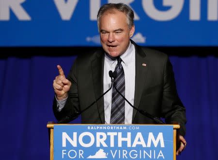 Sen. Tim Kaine (D-VA) speaks at Ralph Northam's election night rally on the campus of George Mason University in Fairfax, Virginia, November 7, 2017. REUTERS/Aaron P. Bernstein