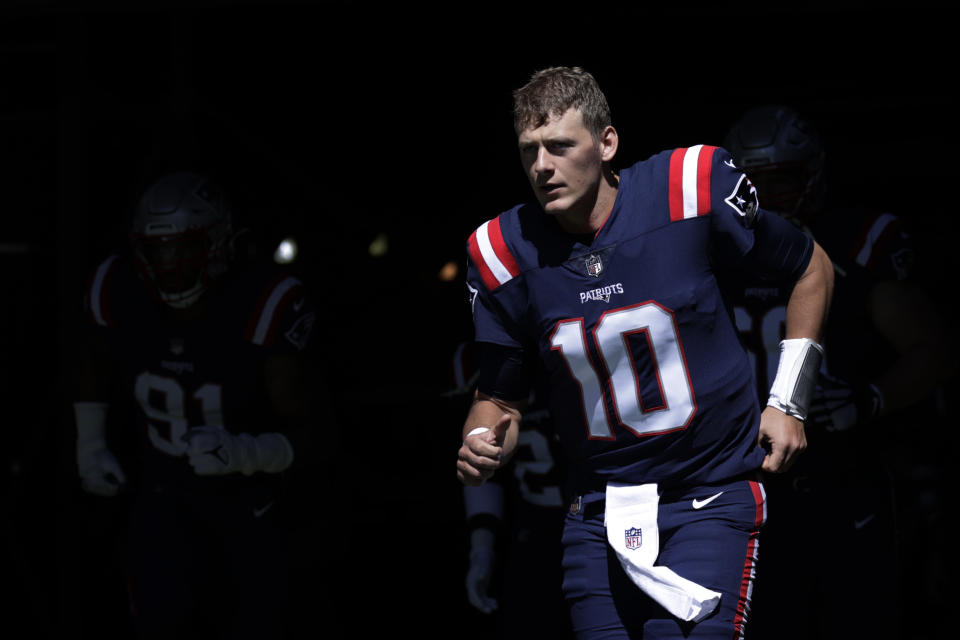 While the major storylines of Patriots-Bucs involve other people, Mac Jones isn't exactly a footnote. (AP Photo/Adam Hunger)