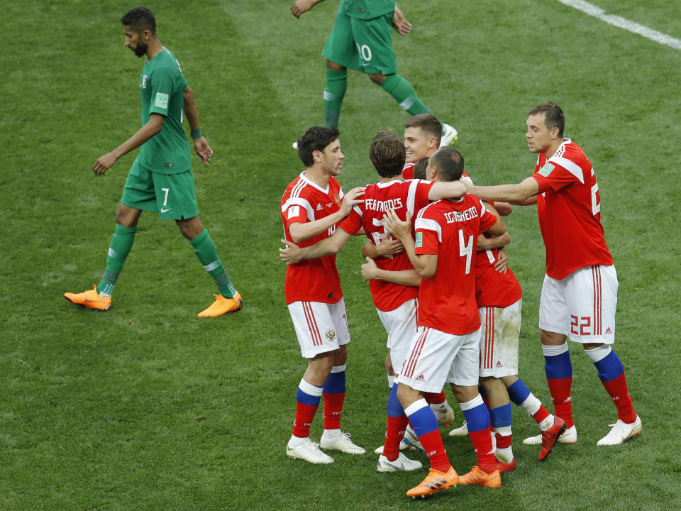 <p>Russian players celebrate their side fifth goal against Saudi Arabia during the opening match of the 2018 soccer World Cup at the Luzhniki stadium in Moscow, Russia, Thursday, June 14, 2018. (AP Photo/Victor Caivano) </p>