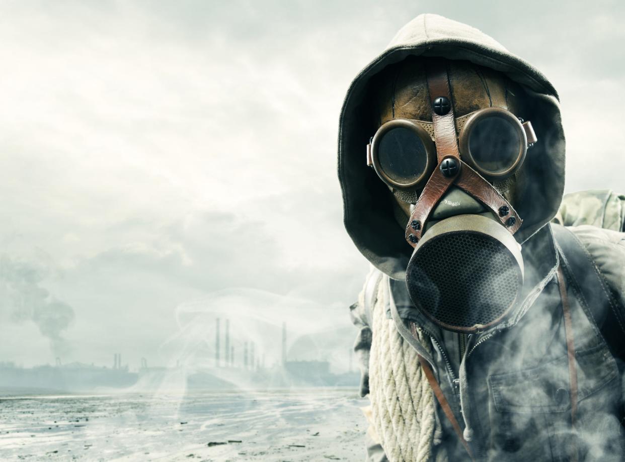 A person wearing a gas mask.