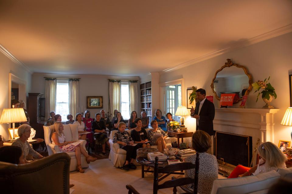Dr. Dave Bhattacharya speaks to a Chattanooga-area gun reform group listen during a meeting at Isabel McCall's home in Lookout Mountain, Tenn., Wednesday, July 26, 2023.