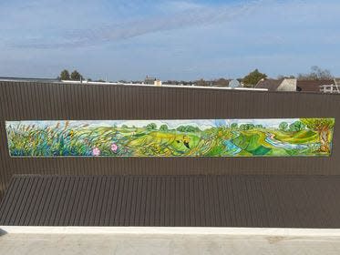 A view of the new mural above Raccoon Valley Bank.