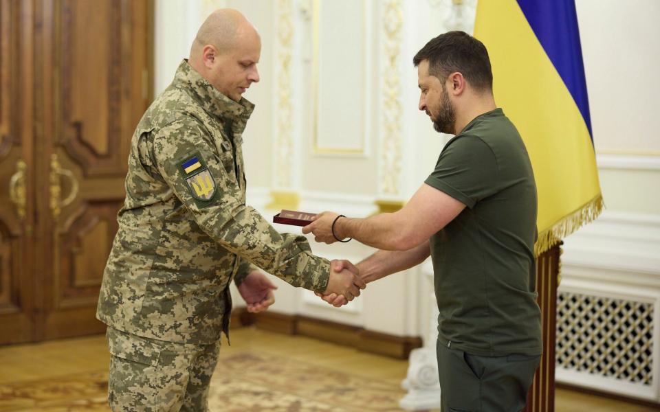 Volodymyr Zelensky presents military medals to Jewish service members on the eve of Rosh Hashanah at Kyiv's Mariinskyi Palace