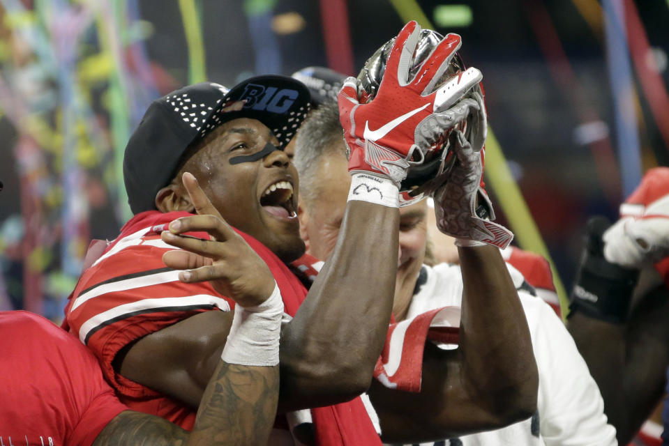 Ohio State wide receiver Terry McLaurin holds the trophy early Sunday, Dec. 2, 2018, after defeating Northwestern 45-24 in the Big Ten championship NCAA college football game in Indianapolis. (AP Photo/AJ Mast)