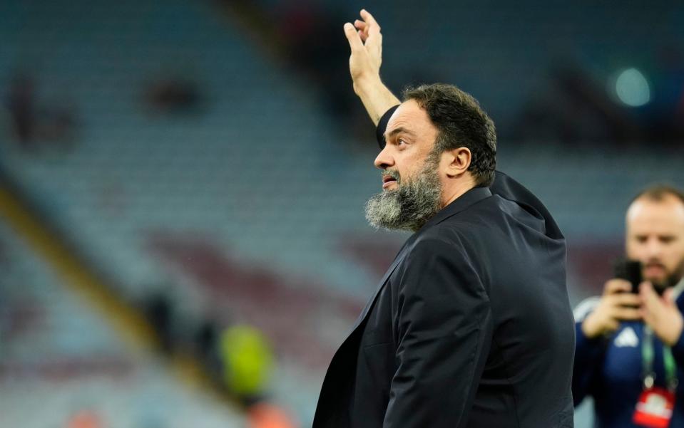 Olympiacos owner Evangelos Marinakis celebrates on the pitch after the UEFA Conference League semi-final, first leg match at Villa Park, Birmingham