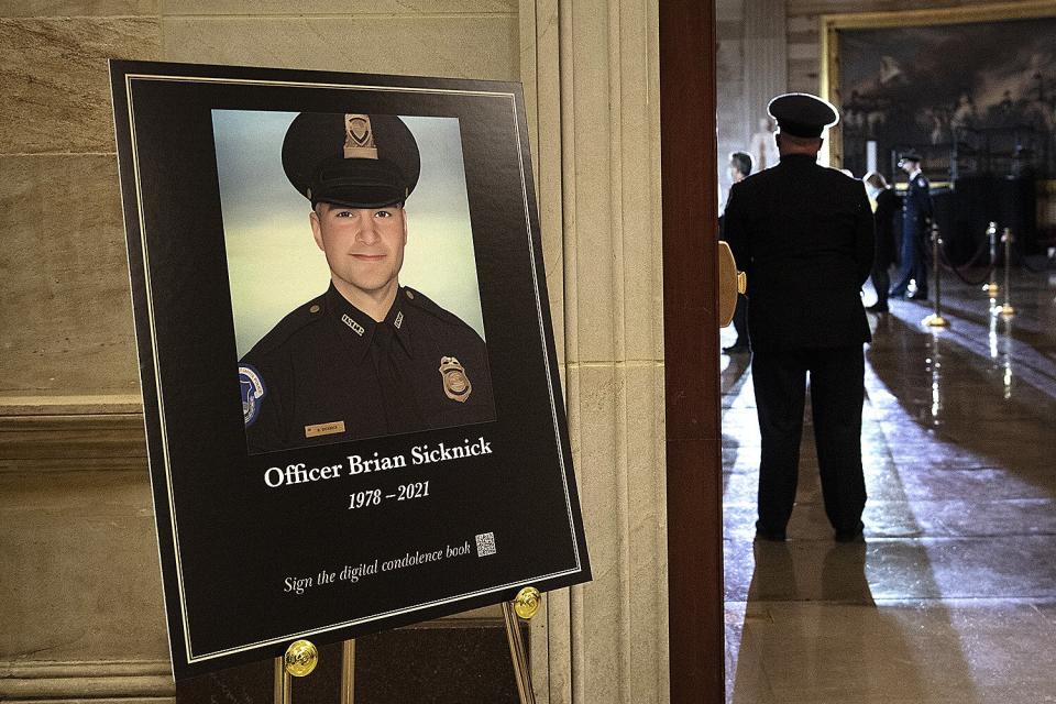 WASHINGTON, DC - FEBRUARY 02: U.S. Capitol Police officers and lawmakers prepare for the arrival of an urn with the cremated remains of fellow officer Brian D. Sicknick at the U.S. Capitol on February 2, 2021 in Washington, DC. Officer Sicknick died as a result of injuries he sustained during the January 6 attack on the U.S. Capitol. He will lie in honor until February 3 and then be buried at Arlington National Cemetery. (Photo by Brendan Smialowski-Pool/Getty Images)