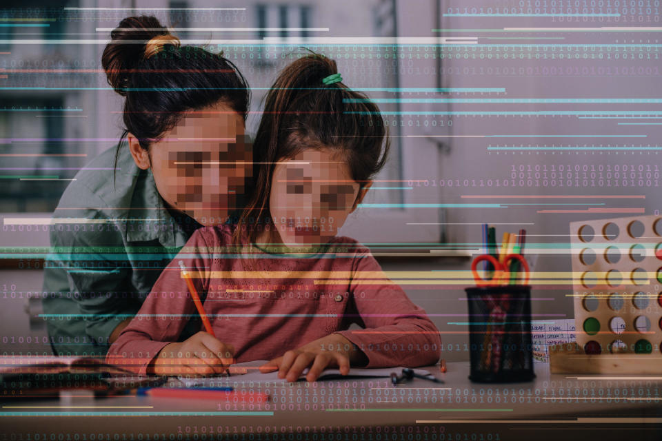 a woman helping a child with homework