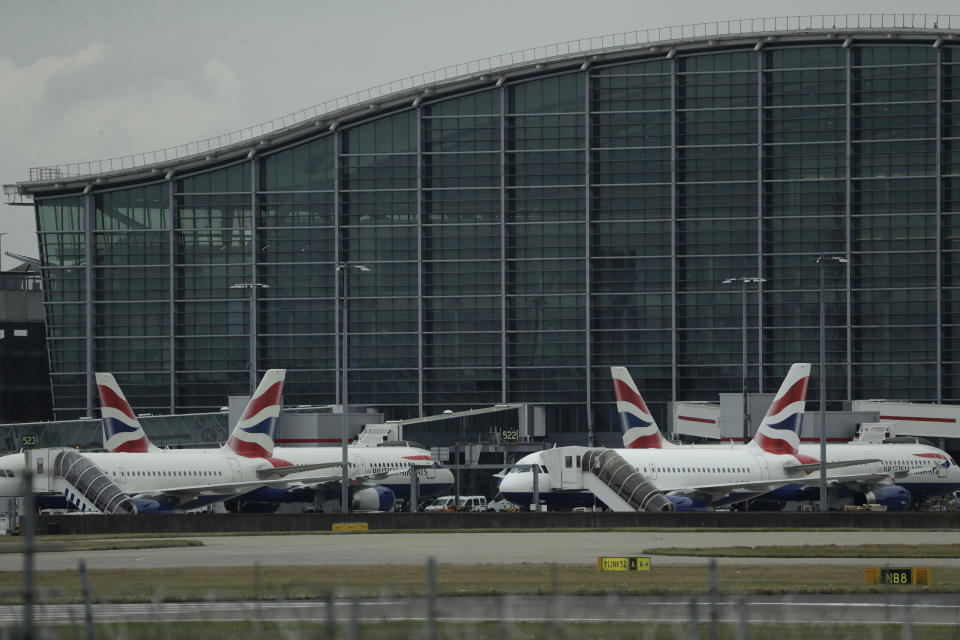 British Airways planes sit parked at Heathrow Airport in London, Monday, Sept. 9, 2019. British Airways says it has had to cancel almost all flights as a result of a pilots' 48-hour strike over pay. (AP Photo/Matt Dunham)