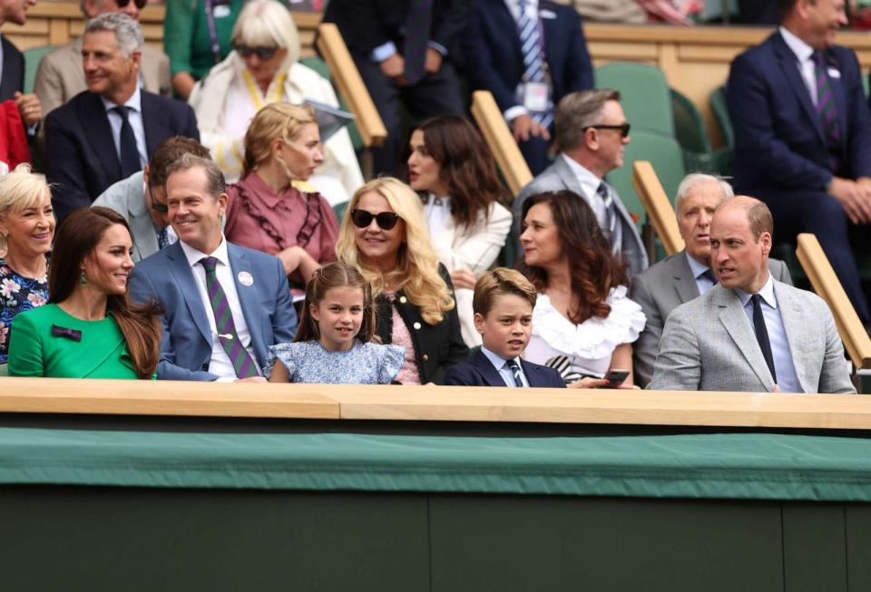 PHOTO: Catherine, Princess of Wales, Princess Charlotte of Wales, Prince George of Wales and Prince William, Prince of Wales, are seen in the Royal Box on day fourteen of The Championships Wimbledon 2023, July 16, 2023, in London. (Julian Finney/Getty Images)