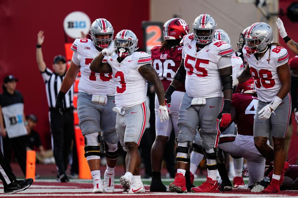 Ohio State running back Miyan Williams (3) celebrates one of his two touchdowns during Saturday's 23-3 win over Indiana.