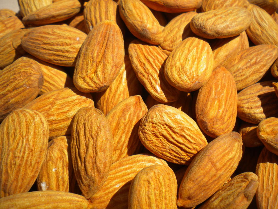 Made by pressing the oil out of ground almond paste, almond oil has a mild nutty flavor and pale yellow hue. It's plush in monounsaturated fat (like olive and avocado oil), vitamin E and phytosterols, plant compounds shown to improve cholesterol numbers. Doing double-duty as vanity fare, it's also lauded as a topical skin moisturizer. Buy all your fruit or nut oils packaged in dark containers to help stymie deterioration from light sources.  <strong>Best Uses:</strong> Add subtle almond nuances to a range of baked goods, including cookies, quick breads and muffins. Homemade granola goes gourmet when made with almond oil, or whirl up your own nut butter by blending together whole almonds with almond oil in a food processor. Roasted almond oil has a more robust nut flavor, so it can add rich taste to salad dressings, pasta dishes and soups.