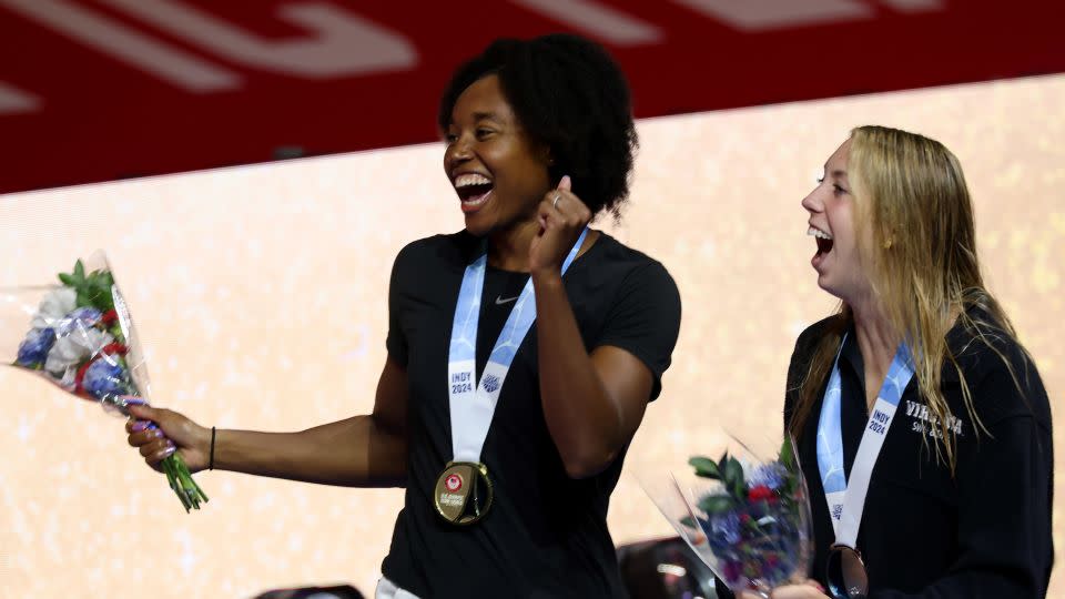 Manuel receives her 50m freestyle medal alongside Gretchen Walsh. - Al Bello/Getty Images