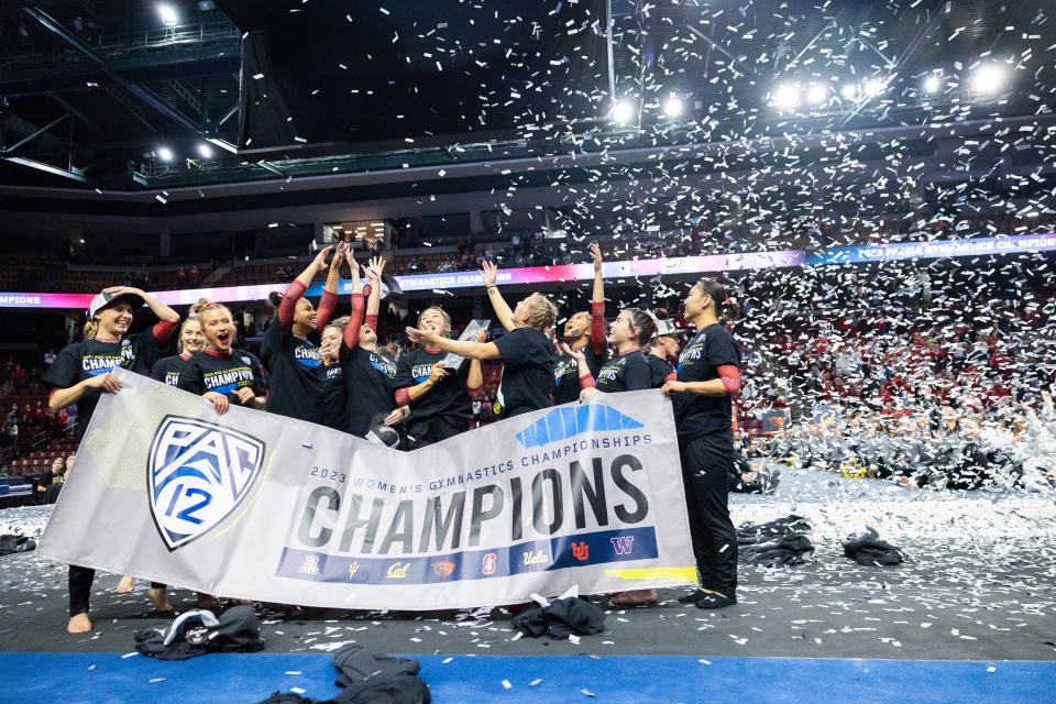 Utah celebrates after winning the Pac-12 Gymnastics Championships at Maverik Center in West Valley City on March 18, 2023.