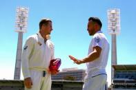 Australian cricket team captain Steve Smith talks with South Africa's captain Faf du Plessis after posing with the series trophy at the WACA Ground in Perth, Australia, November 2, 2016. REUTERS/David Gray