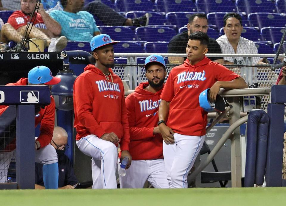 (From left to right) Miami Marlins pitcher Pablo Lopez, Edward Cabrera, Sandy Alcantara, Jesus Luzardo (44) look from the dugout during the eighth inning of their baseball game against the Philadelphia Phillies at loanDepot park on Sunday, September 5, 2021 in Miami, Florida.