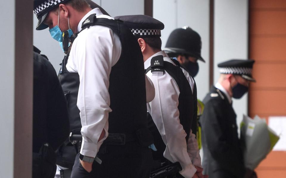 Police officers leave tributes to Sergeant Matiu Ratana outside Croydon Custody Centre on September 27, 2020 in Croydon, England - Peter Summers/Getty Images