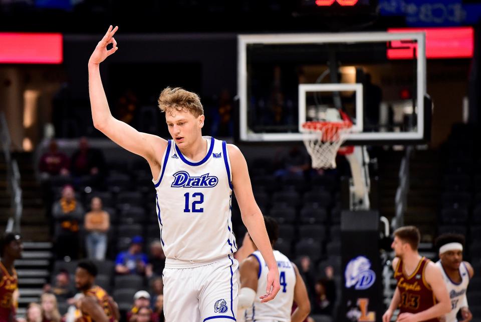 Mar 6, 2022; St. Louis, MO, USA; Drake Bulldogs guard Tucker Devries (12) reacts after making a three pointer against the Loyola Ramblers during the first half  in the finals of the Missouri Valley Conference Tournament at Enterprise Center. Mandatory Credit: Jeff Curry-USA TODAY Sports
