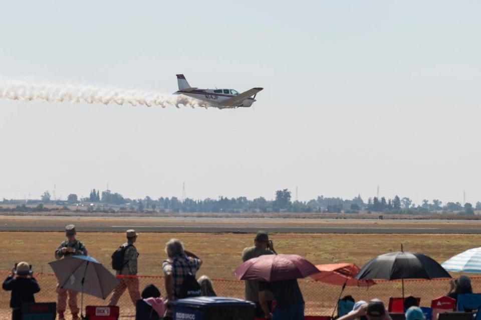 A Beechcraft F33C Bonanza flies by the spectators at the California Capital Airshow on Sunday at Mather Airport.