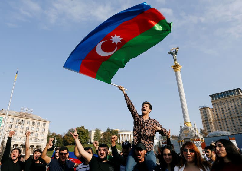 Members of Azerbaijan diaspora hold a rally in support of their country at the Independence Square in Kyiv