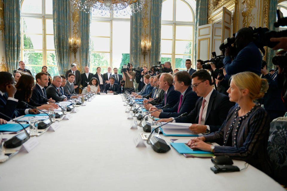 Smith, fourth from bottom right, at a Tech for Good summit with world leaders and top business executives, hosted by French President Emmanuel Macron at the Élysée Palace on May 15 | Isa Harsin—SIPA/AP