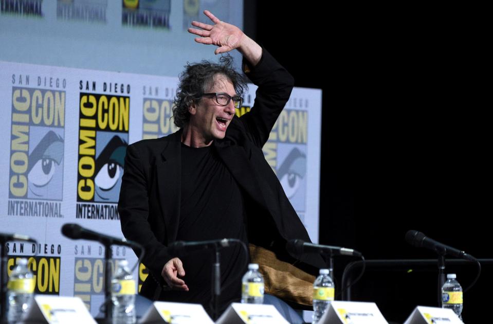 Author Neil Gaiman greets the Comic-Con crowd before rolling the trailer for Netflix's "The Sandman."