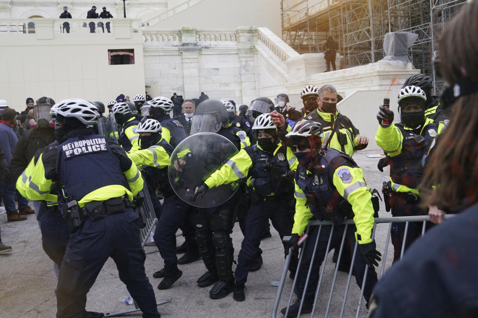 Rioters at the U.S. Capitol on Jan. 6, 2021, in Washington. (AP Photo/John Minchillo)