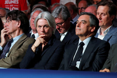 Francois Fillon, former French Prime Minister, member of the Republicans political party and 2017 French presidential election candidate of the French centre-right, and his wife Penelope attend a political rally in Paris, France, April 9, 2017. REUTERS/Benoit Tessier