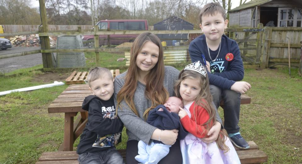 Jordan Corbett and baby son Dennis and with her children Harley, 9, Harrison, 6, and Darcey, 4 (SWNS)
