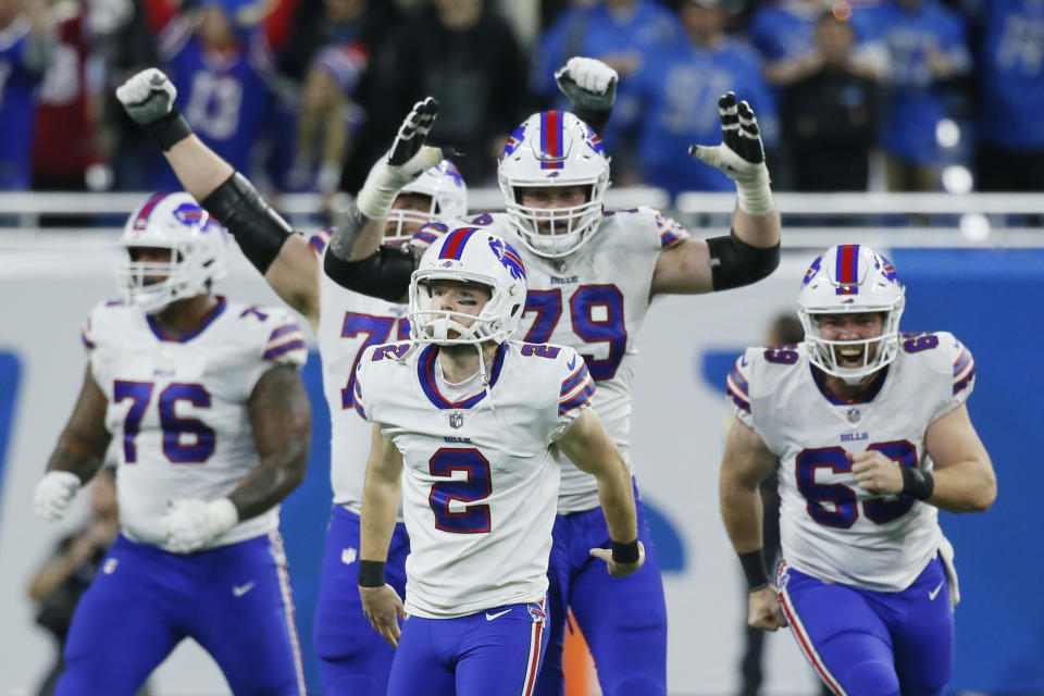 Teammates react after Buffalo Bills place kicker Tyler Bass (2) kicked a 45-yard game winning field goal in the closing seconds of an NFL football game against the Detroit Lions, Thursday, Nov. 24, 2022, in Detroit. (AP Photo/Duane Burleson)