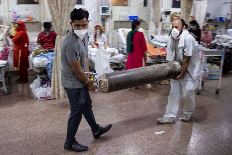 The Wider Image: As COVID ravages India, a 26-year-old doctor decides who lives and who dies