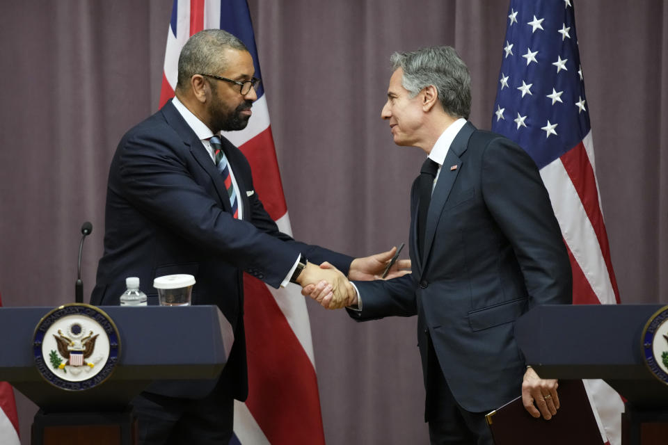 Secretary of State Antony Blinken, right, shakes hands with British Foreign Secretary James Cleverly after participating in a joint press conference, Tuesday, May 9, 2023, at the U.S. State Department in Washington. (AP Photo/Patrick Semansky)