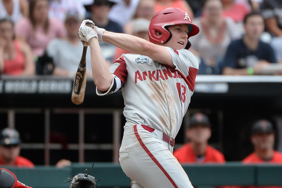 Jun 17, 2019; Omaha, NE, USA; Arkansas Razorbacks outfielder Heston Kjerstad (18) singles in the eighth inning against the Texas Tech Red Raiders in the 2019 College World Series at TD Ameritrade Park. Mandatory Credit: Steven Branscombe-USA TODAY Sports