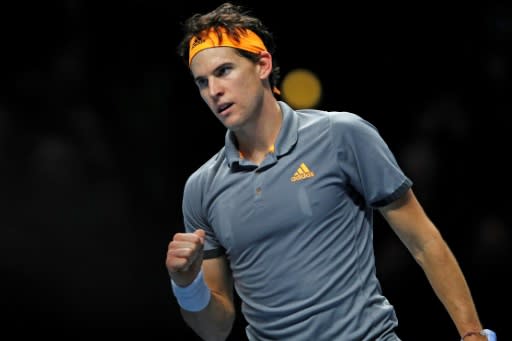 Austria's Dominic Thiem beat Roger Federer in their ATP Finals opener