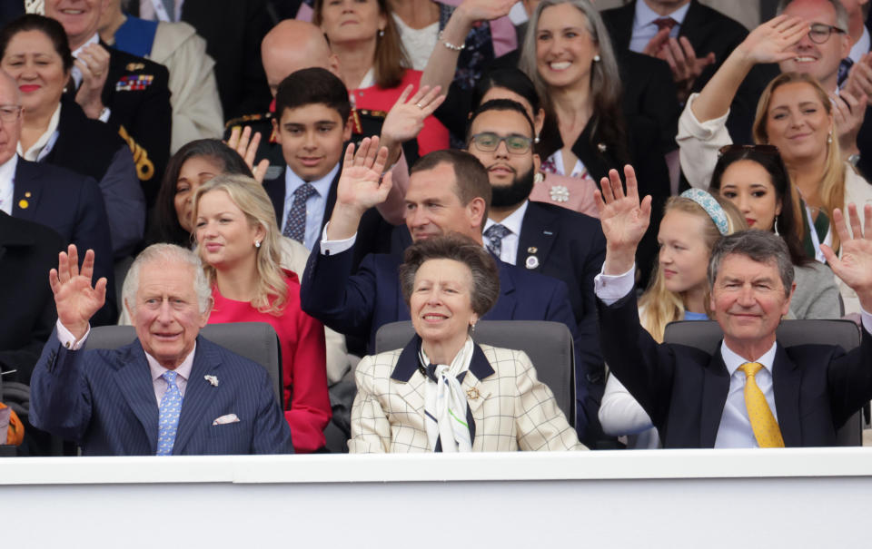Front row left to right, the Prince of Wales; Princess Royal and Vice Admiral Sir Tim Laurence and second row, Autumn Kelly, Peter Phillips and Savannah Phillips wave during the pageant. (PA)