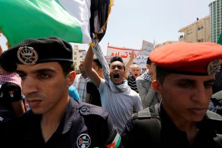 Protestors chant slogans during a demonstration near the Israeli embassy in Amman, Jordan July 28, 2017. REUTERS/Muhammad Hamed