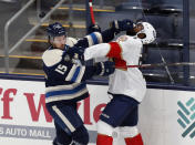Columbus Blue Jackets defenseman Michael Del Zotto, left, shoves Florida Panthers forward Anthony Duclair during the second period of an NHL hockey game in Columbus, Ohio, Tuesday, Jan. 26, 2021. (AP Photo/Paul Vernon)