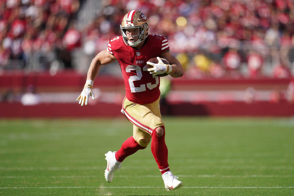 Oct 1, 2023; Santa Clara, California, USA; San Francisco 49ers running back <a class="link " href="https://sports.yahoo.com/nfl/players/30121" data-i13n="sec:content-canvas;subsec:anchor_text;elm:context_link" data-ylk="slk:Christian McCaffrey;sec:content-canvas;subsec:anchor_text;elm:context_link;itc:0">Christian McCaffrey</a> (23) runs the ball against the <a class="link " href="https://sports.yahoo.com/nfl/teams/arizona/" data-i13n="sec:content-canvas;subsec:anchor_text;elm:context_link" data-ylk="slk:Arizona Cardinals;sec:content-canvas;subsec:anchor_text;elm:context_link;itc:0">Arizona Cardinals</a> in the third quarter at Levi’s Stadium. Mandatory Credit: Cary Edmondson-USA TODAY Sports