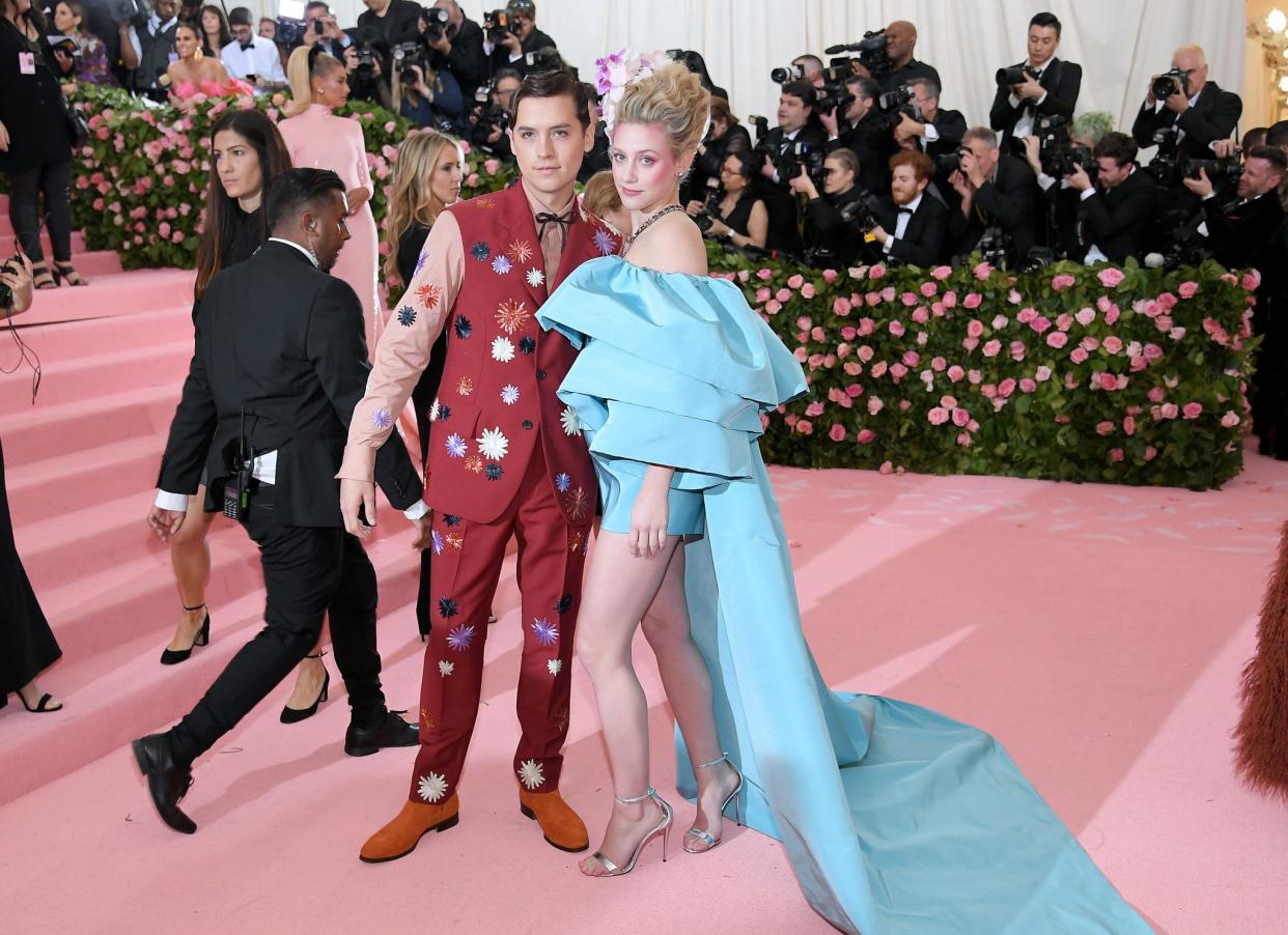 Cole Sprouse and Lily Reinhart attend The 2019 Met Gala Celebrating Camp: Notes on Fashion at Metropolitan Museum of Art on May 06, 2019 in New York City.