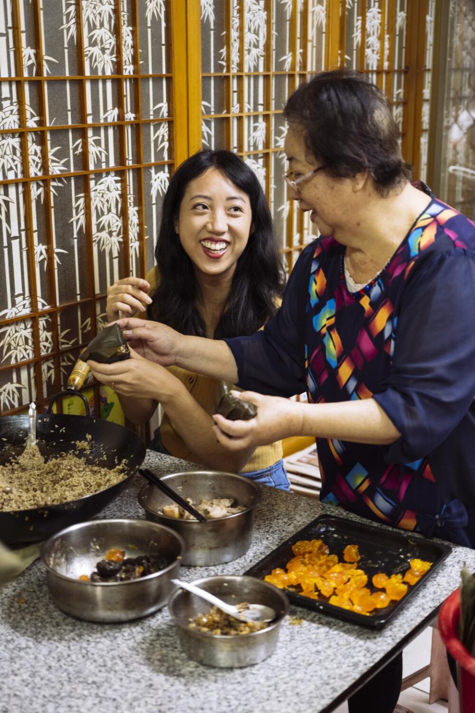 Clarissa Wei and her waipo make zongzi