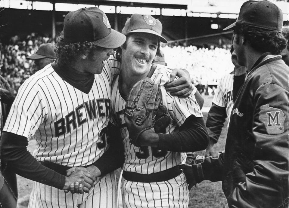 Milwaukee Brewers pitcher Moose Haas received congratulations from Lary Sorenson and Jerry Augustine (right) after his 14-strikeout game in a 5-3 victory over the New York Yankees on April 12, 1978.