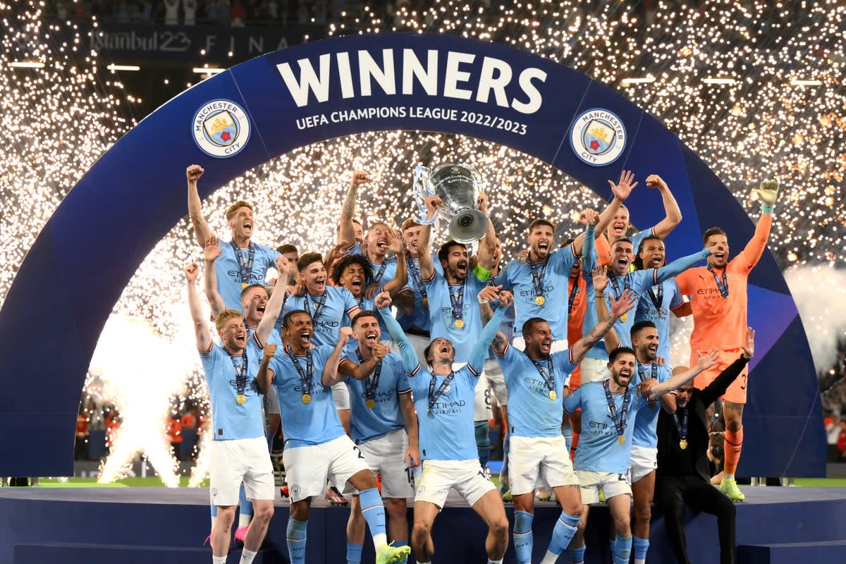 Manchester City lift the Champions League trophy after the 2022/23 final  (Getty Images)