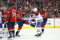 Oct 7, 2017; Washington, DC, USA; Washington Capitals defenseman Brooks Orpik (44) kicks Montreal Canadiens left wing Charles Hudon (54) after exchanging words during the second period at Verizon Center. Mandatory Credit: Amber Searls-USA TODAY Sports