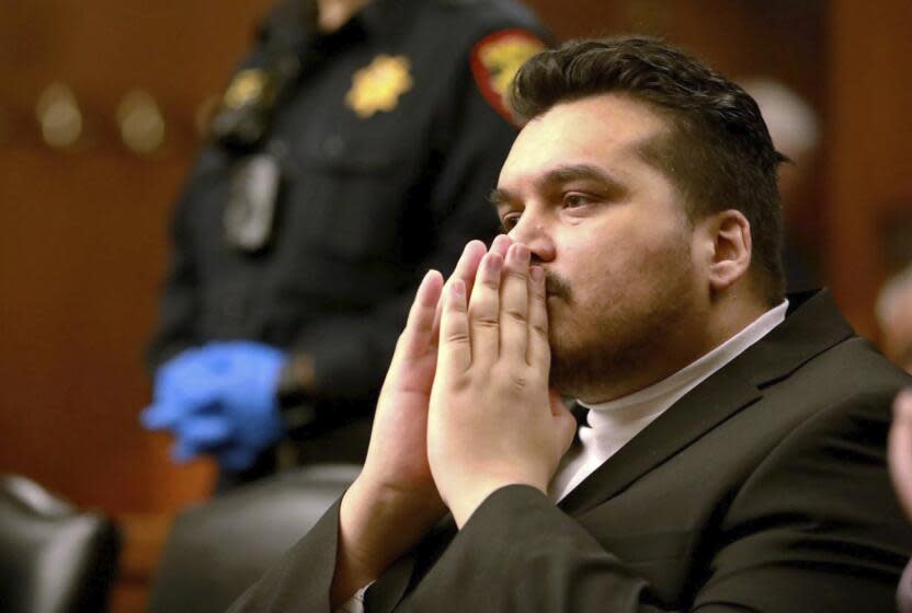 Jose Rafael Solano Landaeta sits in a San Mateo County courtroom in Redwood City, Calif., on Monday, Nov. 20, 2023. Landaeta was found guilty of first-degree murder for beheading his girlfriend with a samurai sword on a city street last year. A jury returned the verdict against the Northern California man on Monday and continued to deliberate a series of aggravating factors that would affect sentencing. (Nicholas Mazzoni/Redwood City Pulse via AP, Pool)