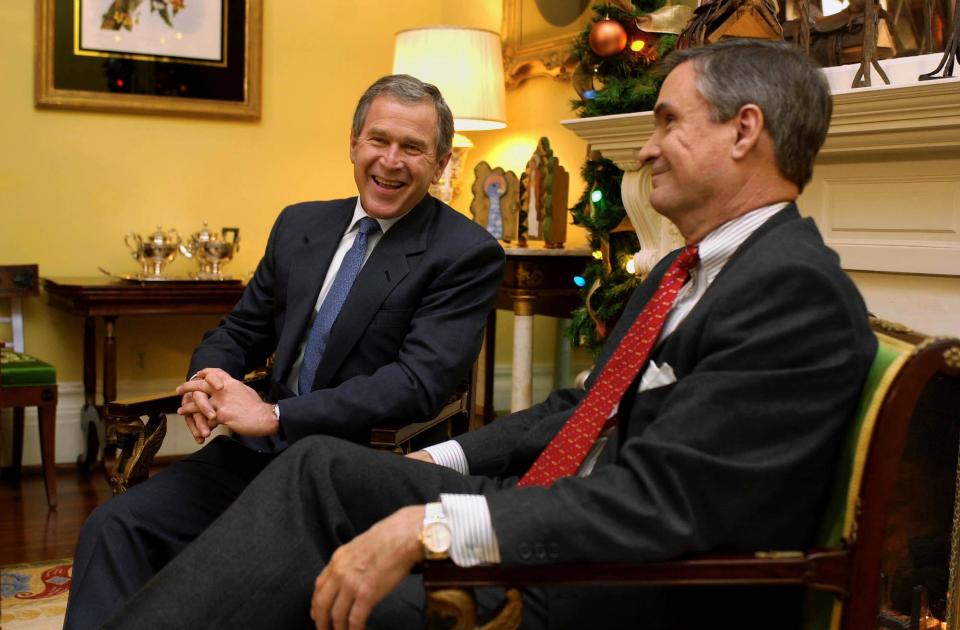 Former President George W. Bush with former Sen. John Breaux.